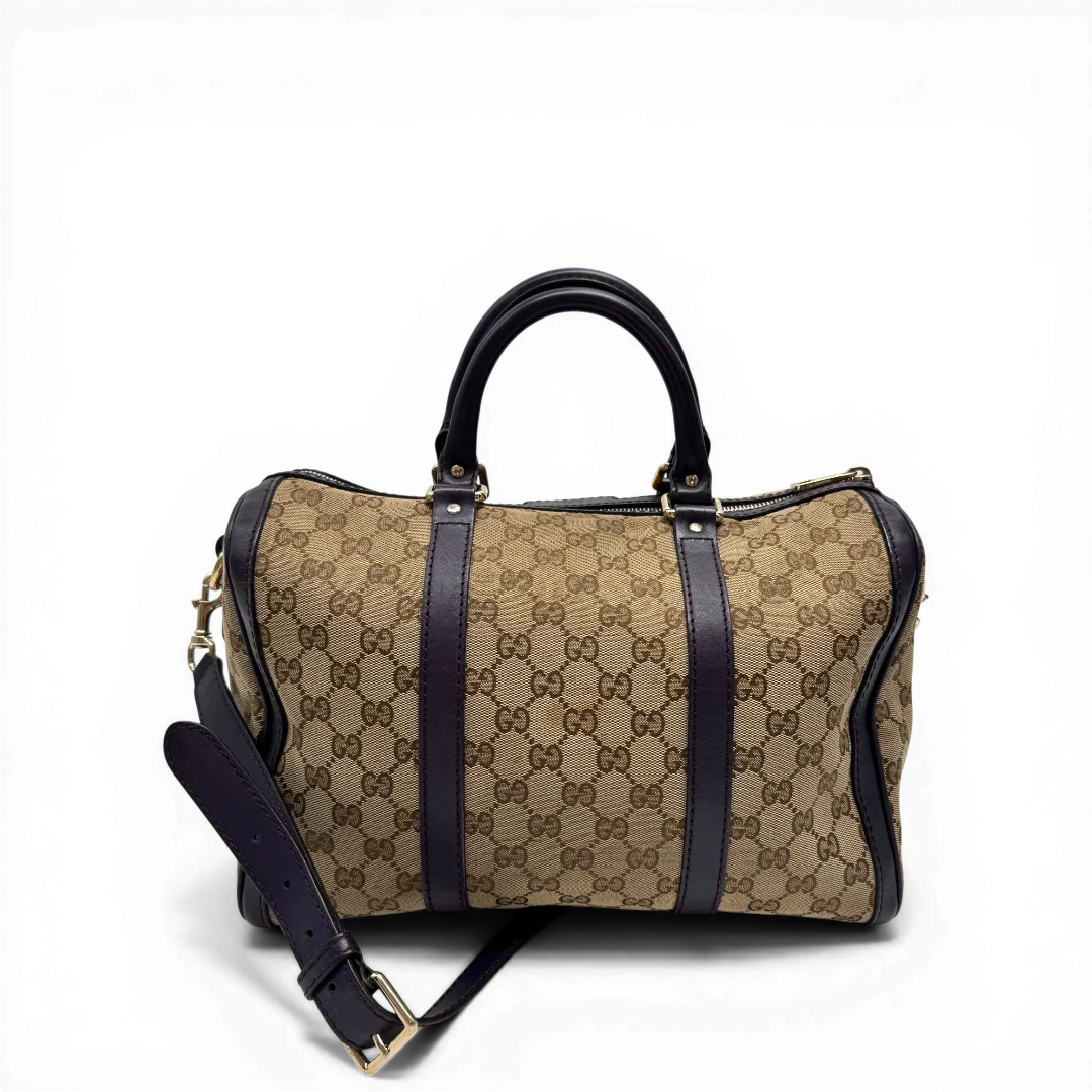 https://cdn.shopify.com/s/files/1/0564/9376/8855/files/Gucci_Handtasche_Boston_mit_Umhangegurt_monogram_beige_vintage_GG9940.webp?v=1775725815