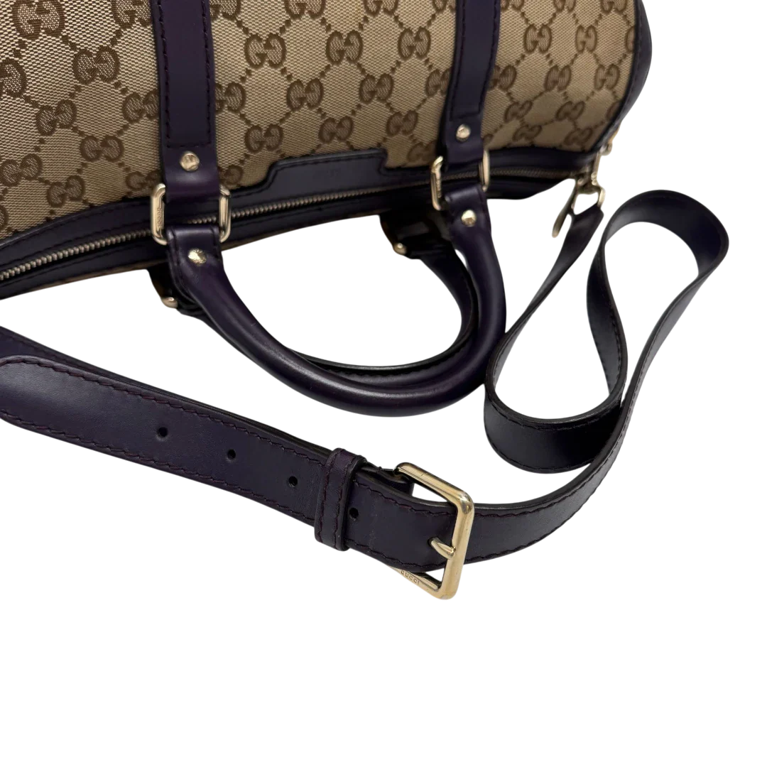 https://cdn.shopify.com/s/files/1/0564/9376/8855/files/Gucci_Handtasche_Boston_mit_Umhangegurt_monogram_beige_vintage_GG9947.webp?v=1775725815