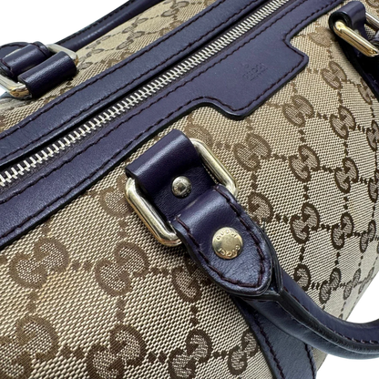 https://cdn.shopify.com/s/files/1/0564/9376/8855/files/Gucci_Handtasche_Boston_mit_Umhangegurt_monogram_beige_vintage_GG9949.webp?v=1775725815