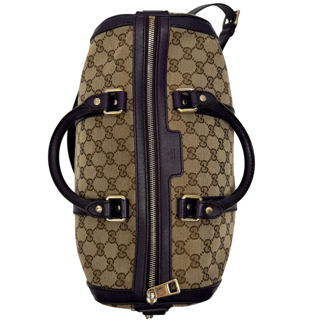 https://cdn.shopify.com/s/files/1/0564/9376/8855/files/Gucci_Handtasche_Boston_mit_Umhangegurt_monogram_beige_vintage_GG9957.webp?v=1775725815