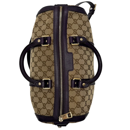https://cdn.shopify.com/s/files/1/0564/9376/8855/files/Gucci_Handtasche_Boston_mit_Umhangegurt_monogram_beige_vintage_GG9957.webp?v=1775725815