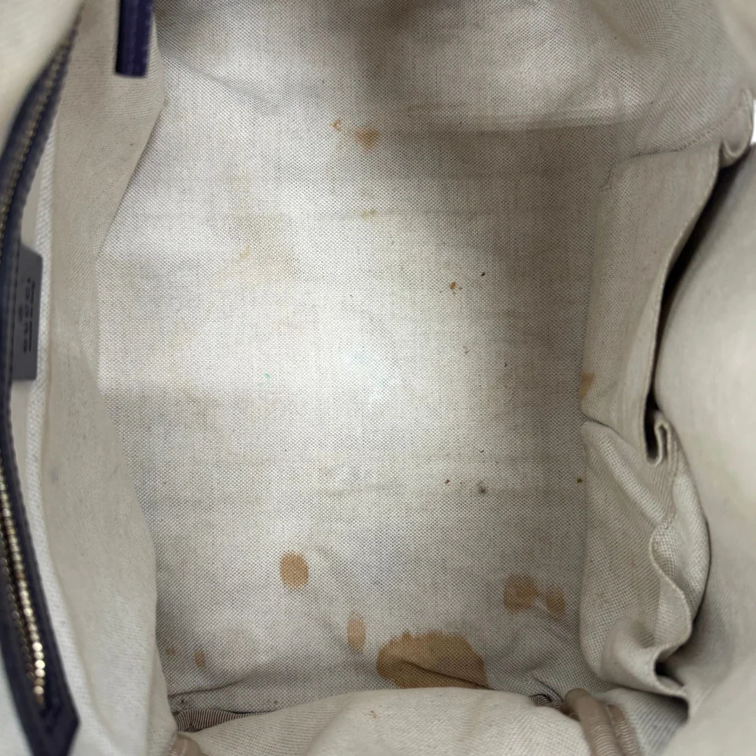 https://cdn.shopify.com/s/files/1/0564/9376/8855/files/Gucci_Handtasche_Boston_mit_Umhangegurt_monogram_beige_vintage_GG9958.webp?v=1775725815