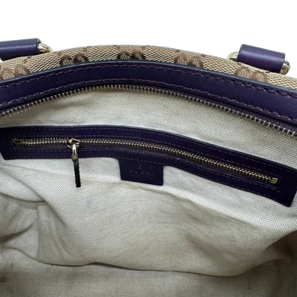 https://cdn.shopify.com/s/files/1/0564/9376/8855/files/Gucci_Handtasche_Boston_mit_Umhangegurt_monogram_beige_vintage_GG9961.webp?v=1775725815