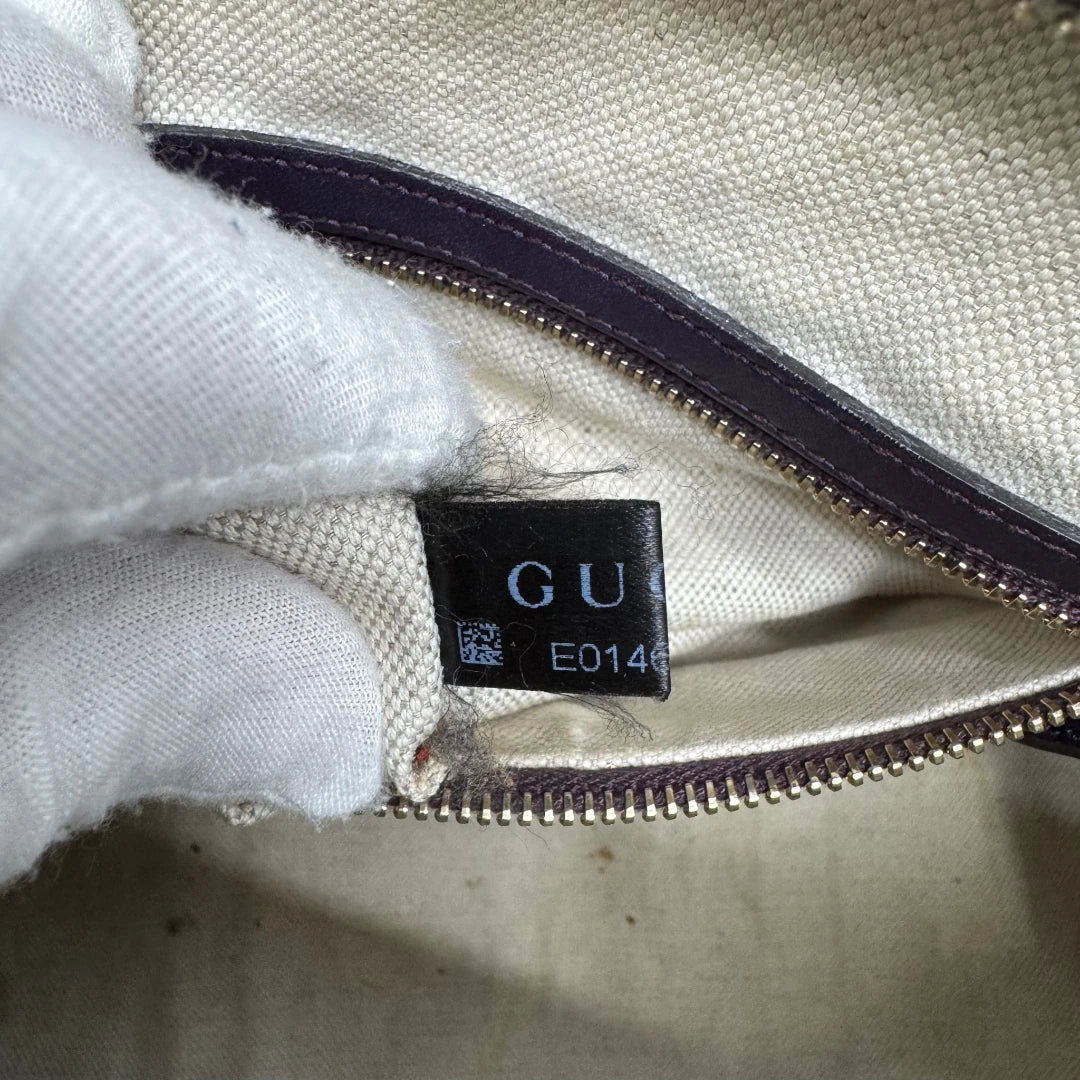 https://cdn.shopify.com/s/files/1/0564/9376/8855/files/Gucci_Handtasche_Boston_mit_Umhangegurt_monogram_beige_vintage_GG9964.webp?v=1775725815