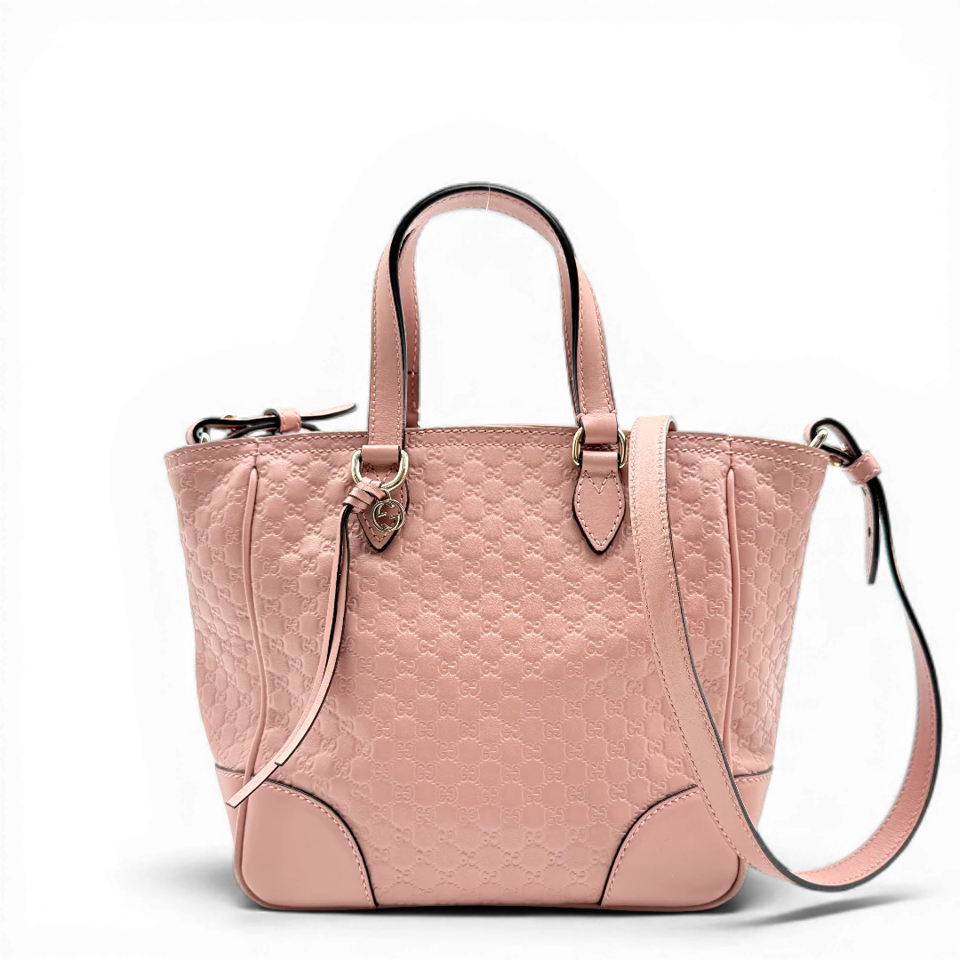 https://cdn.shopify.com/s/files/1/0564/9376/8855/files/Gucci_Handtasche_Bree_micro_Guccissima_aus_Leder_rosa_vintage_GG_1562.webp?v=1772102458