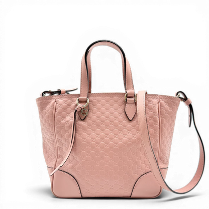 https://cdn.shopify.com/s/files/1/0564/9376/8855/files/Gucci_Handtasche_Bree_micro_Guccissima_aus_Leder_rosa_vintage_GG_1562.webp?v=1772102458