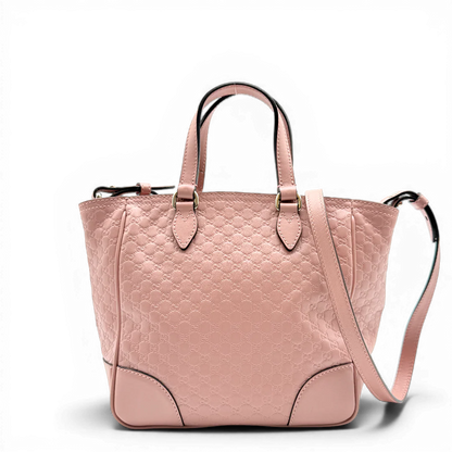 https://cdn.shopify.com/s/files/1/0564/9376/8855/files/Gucci_Handtasche_Bree_micro_Guccissima_aus_Leder_rosa_vintage_GG_1563.webp?v=1772102599