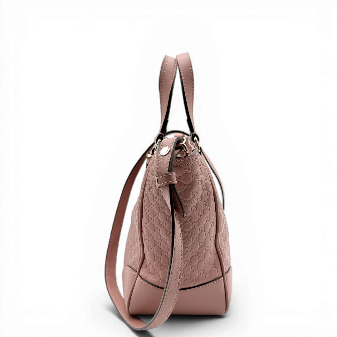 https://cdn.shopify.com/s/files/1/0564/9376/8855/files/Gucci_Handtasche_Bree_micro_Guccissima_aus_Leder_rosa_vintage_GG_1566.webp?v=1772102599