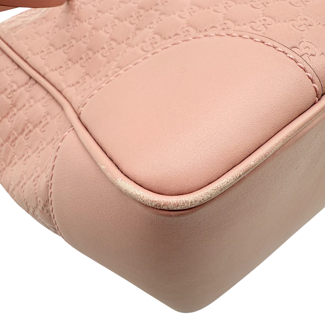 https://cdn.shopify.com/s/files/1/0564/9376/8855/files/Gucci_Handtasche_Bree_micro_Guccissima_aus_Leder_rosa_vintage_GG_1569.webp?v=1772102599