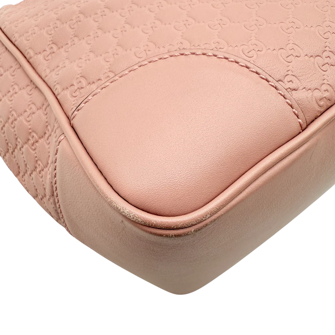 https://cdn.shopify.com/s/files/1/0564/9376/8855/files/Gucci_Handtasche_Bree_micro_Guccissima_aus_Leder_rosa_vintage_GG_1571.webp?v=1772102599