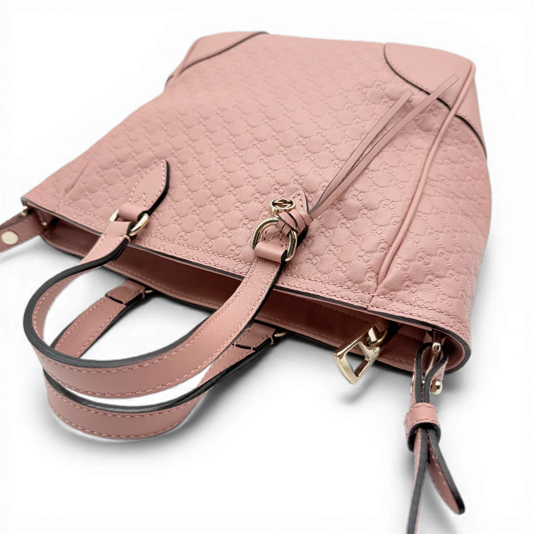 https://cdn.shopify.com/s/files/1/0564/9376/8855/files/Gucci_Handtasche_Bree_micro_Guccissima_aus_Leder_rosa_vintage_GG_1573.webp?v=1772102599