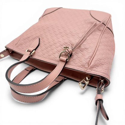 https://cdn.shopify.com/s/files/1/0564/9376/8855/files/Gucci_Handtasche_Bree_micro_Guccissima_aus_Leder_rosa_vintage_GG_1573.webp?v=1772102599