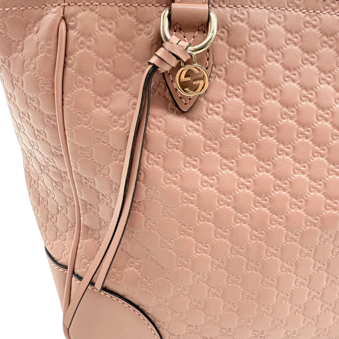 https://cdn.shopify.com/s/files/1/0564/9376/8855/files/Gucci_Handtasche_Bree_micro_Guccissima_aus_Leder_rosa_vintage_GG_1575.webp?v=1772102599