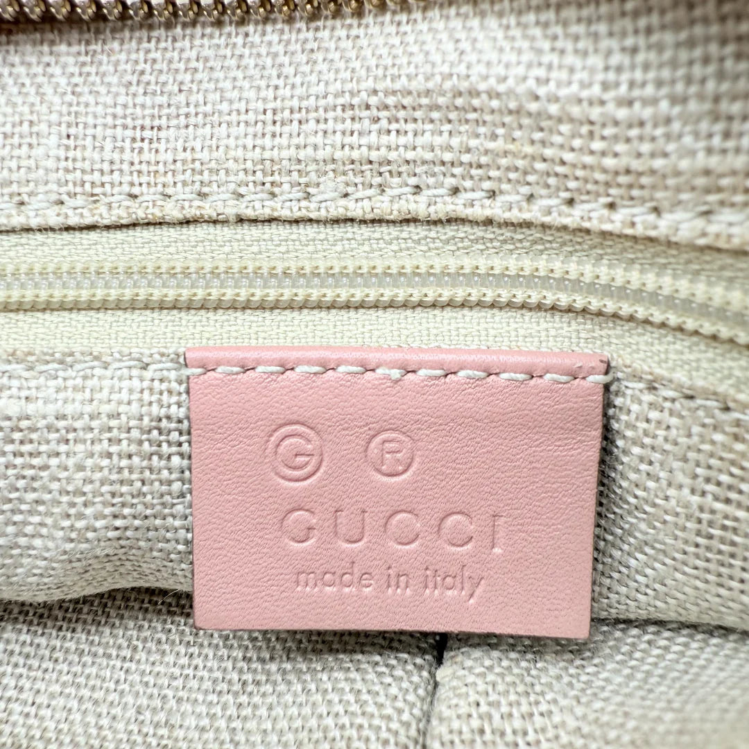 https://cdn.shopify.com/s/files/1/0564/9376/8855/files/Gucci_Handtasche_Bree_micro_Guccissima_aus_Leder_rosa_vintage_GG_1577.webp?v=1772102599