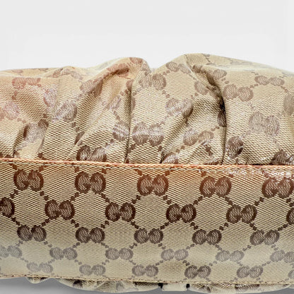 https://cdn.shopify.com/s/files/1/0564/9376/8855/files/Gucci_Handtasche_D-Ring_PVC_medium_monogram_beige_vintage_GG_7394.webp?v=1767882624
