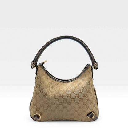 https://cdn.shopify.com/s/files/1/0564/9376/8855/files/Gucci_Handtasche_D-Ring_khaki_Lederdetails_monogram_beige_second_hand_luxury_GG_handbag_8405.webp?v=1741950500