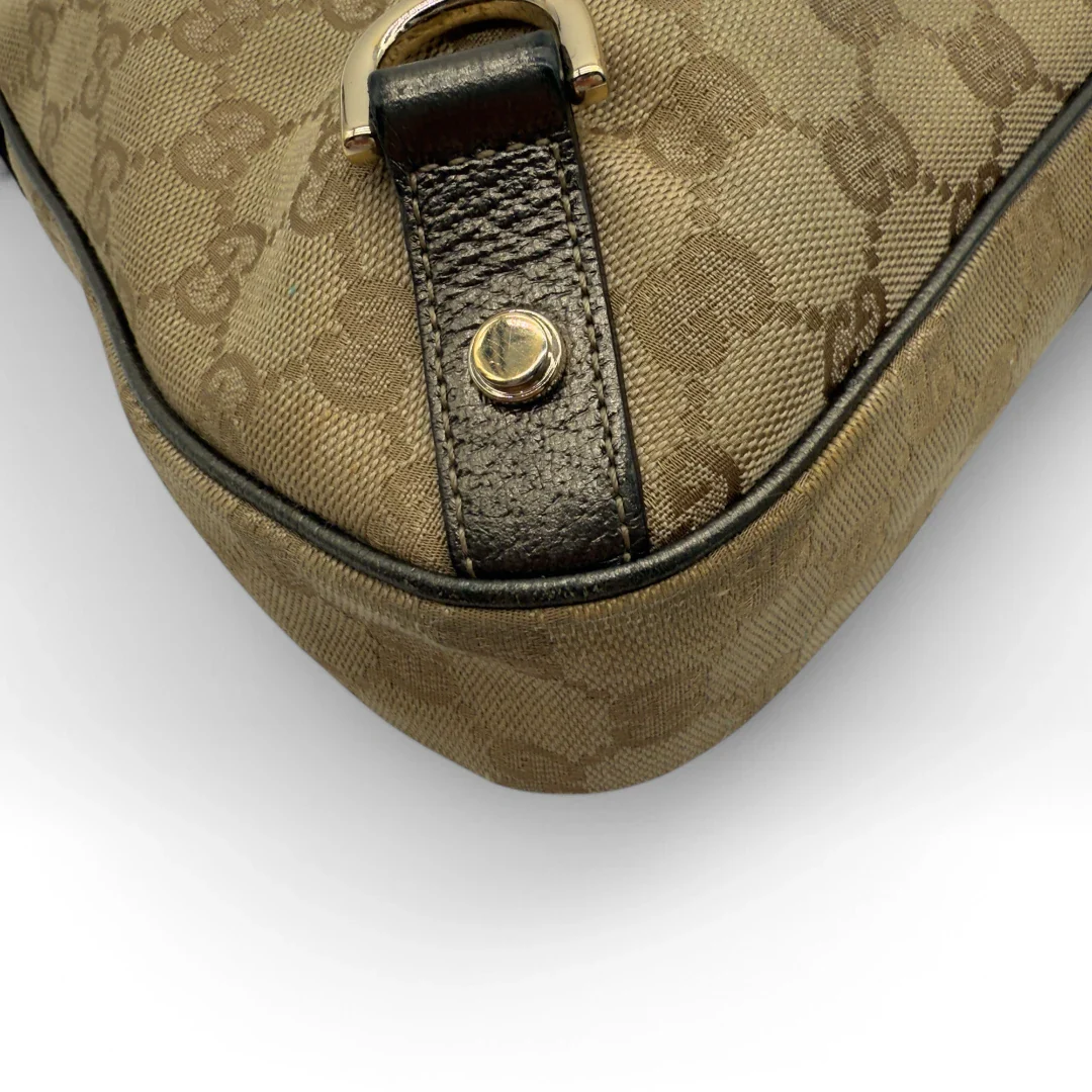 https://cdn.shopify.com/s/files/1/0564/9376/8855/files/Gucci_Handtasche_D-Ring_khaki_Lederdetails_monogram_beige_second_hand_luxury_GG_handbag_8415.webp?v=1741950500
