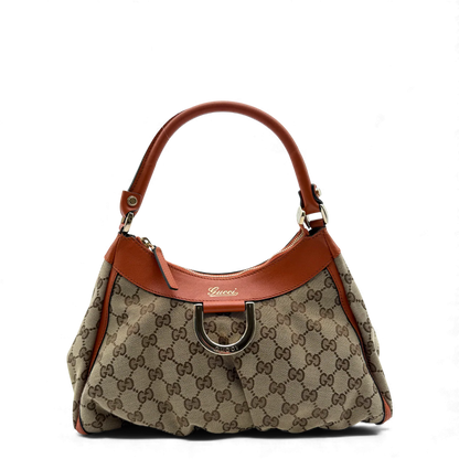 https://cdn.shopify.com/s/files/1/0564/9376/8855/files/Gucci_Handtasche_D-Ring_monogram_beige_vintage_GG_handbag3414.webp?v=1764856666