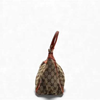 https://cdn.shopify.com/s/files/1/0564/9376/8855/files/Gucci_Handtasche_D-Ring_monogram_beige_vintage_GG_handbag3416.webp?v=1764856666