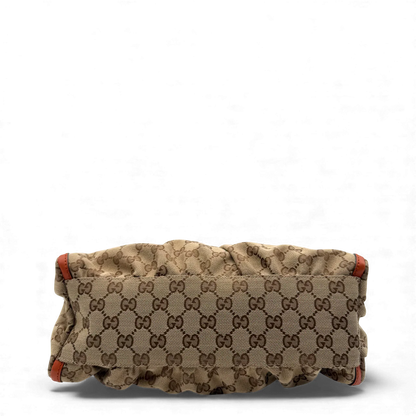 https://cdn.shopify.com/s/files/1/0564/9376/8855/files/Gucci_Handtasche_D-Ring_monogram_beige_vintage_GG_handbag3417.webp?v=1764856666