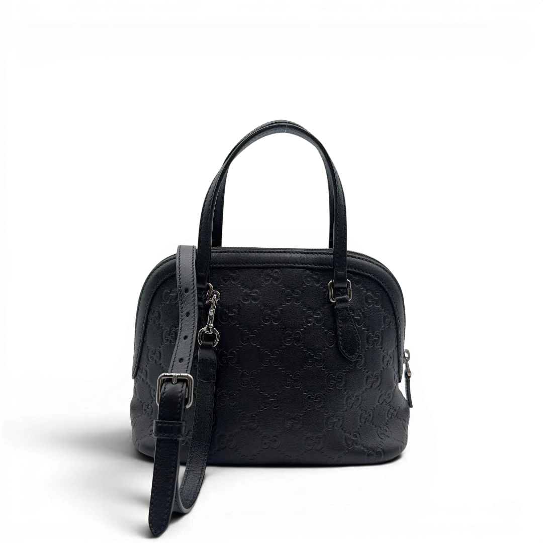 https://cdn.shopify.com/s/files/1/0564/9376/8855/files/Gucci_Handtasche_Dome_Guccissima_mit_Umhangegurt_monogram_schwarz_1.webp?v=1782906927