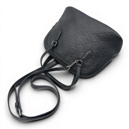 https://cdn.shopify.com/s/files/1/0564/9376/8855/files/Gucci_Handtasche_Dome_Guccissima_mit_Umhangegurt_monogram_schwarz_10.webp?v=1782906928