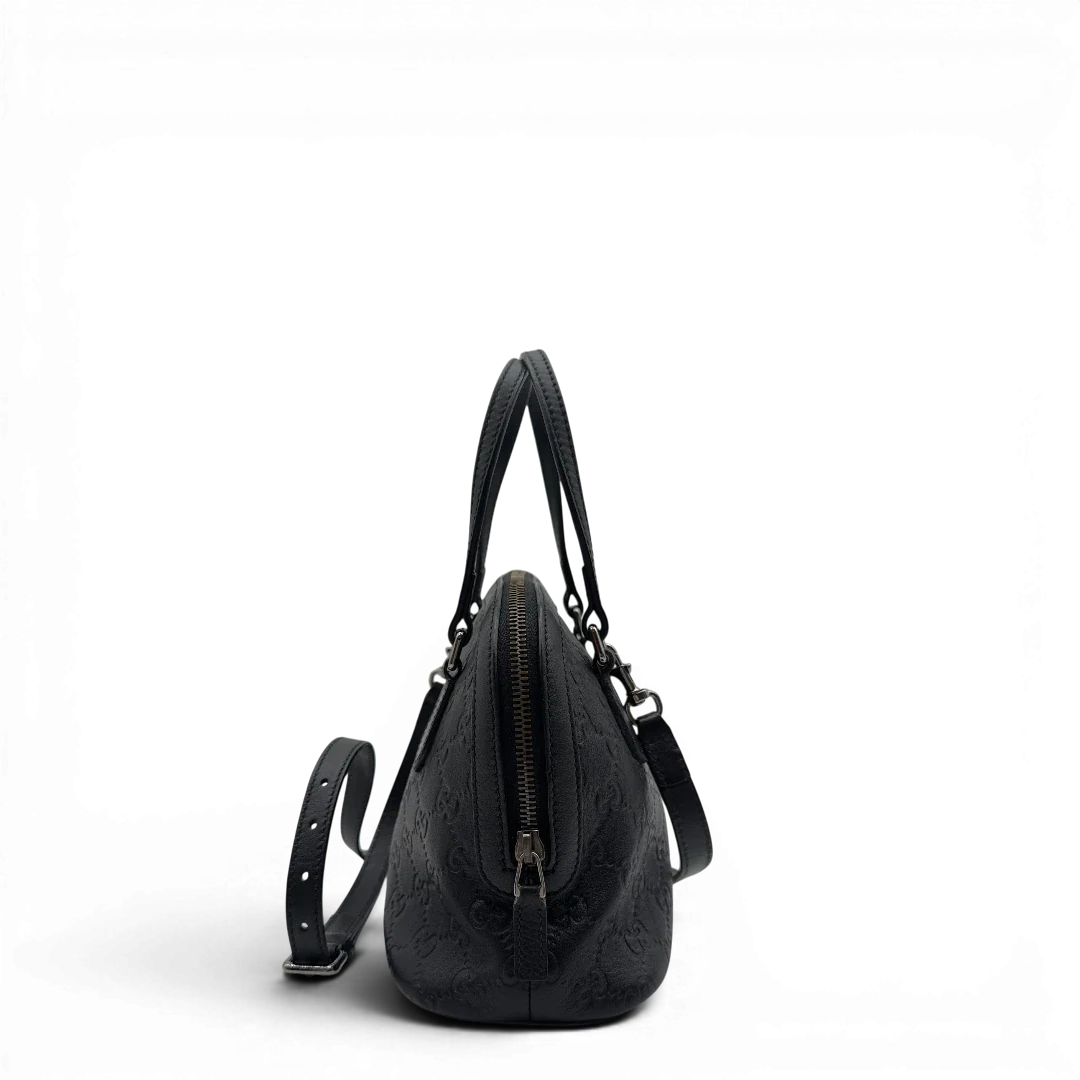 https://cdn.shopify.com/s/files/1/0564/9376/8855/files/Gucci_Handtasche_Dome_Guccissima_mit_Umhangegurt_monogram_schwarz_3.webp?v=1782906927