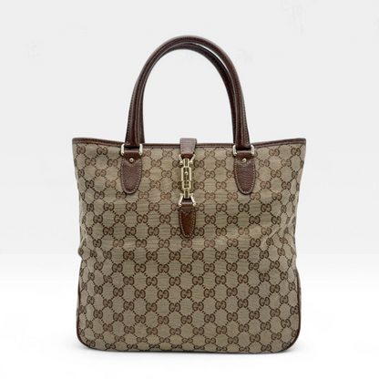 https://cdn.shopify.com/s/files/1/0564/9376/8855/files/Gucci_Handtasche_Jackie_Tote_bag_monogram_beige_Vintage_luxury_GG_handbag1288.webp?v=1752678085
