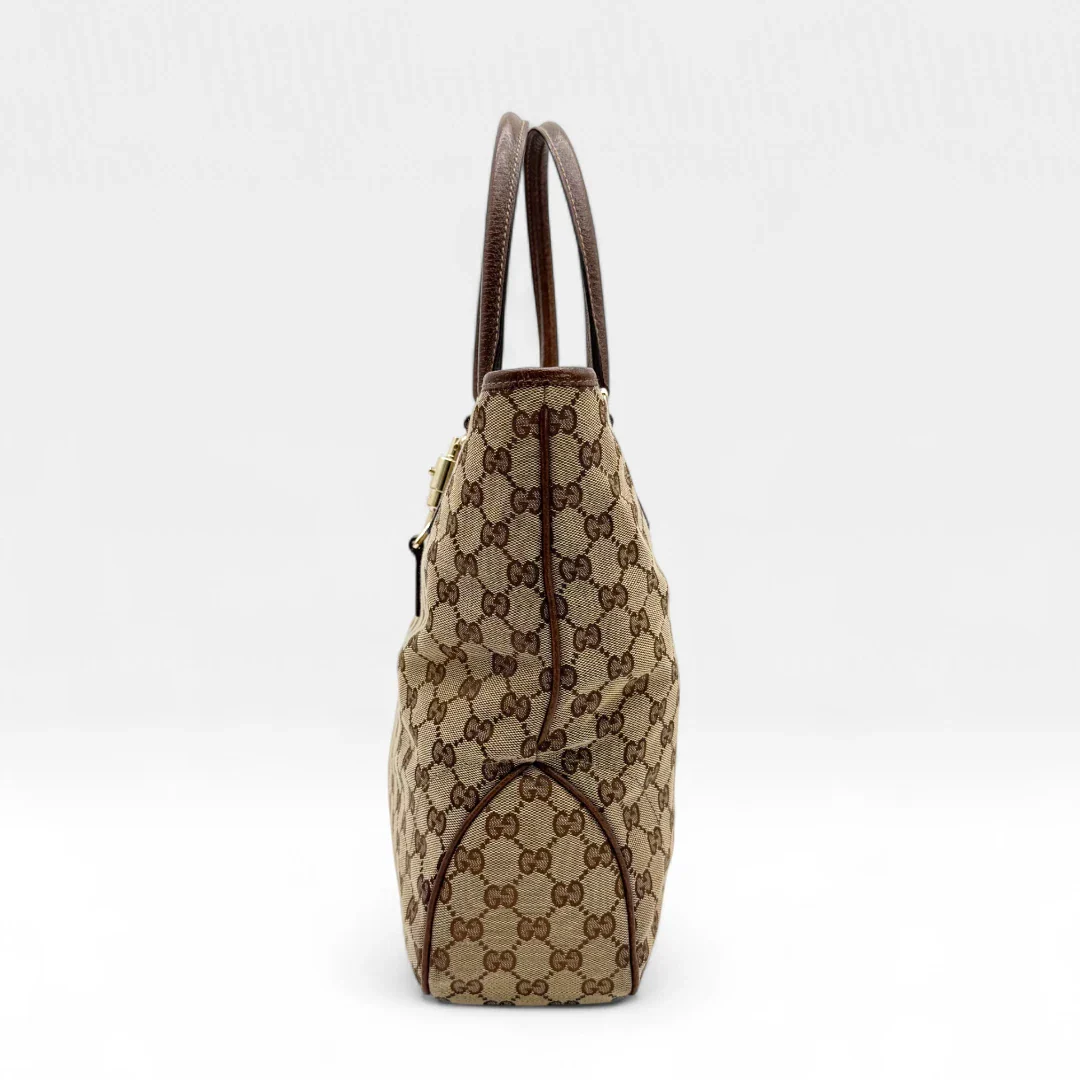 https://cdn.shopify.com/s/files/1/0564/9376/8855/files/Gucci_Handtasche_Jackie_Tote_bag_monogram_beige_Vintage_luxury_GG_handbag1291.webp?v=1752678251