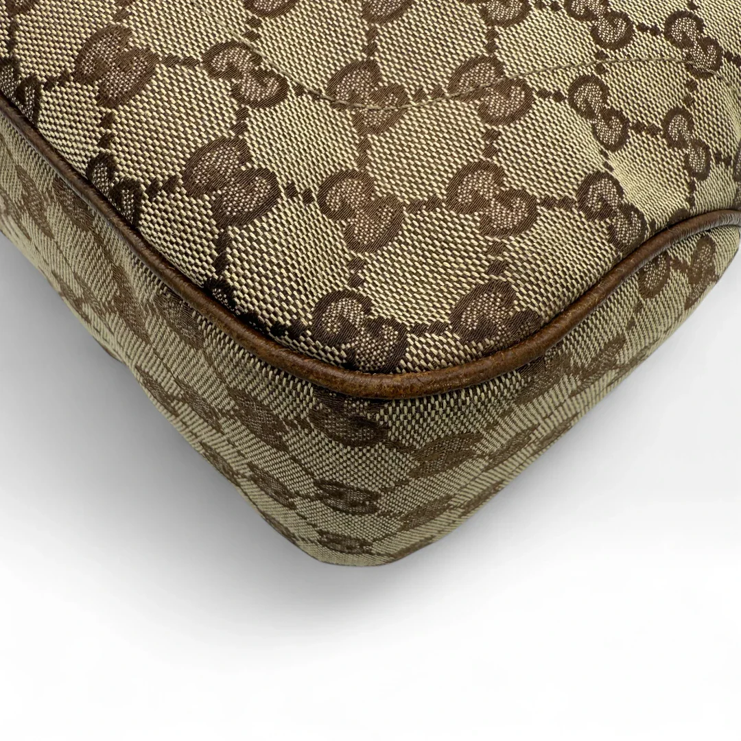 https://cdn.shopify.com/s/files/1/0564/9376/8855/files/Gucci_Handtasche_Jackie_Tote_bag_monogram_beige_Vintage_luxury_GG_handbag1293.webp?v=1752678251