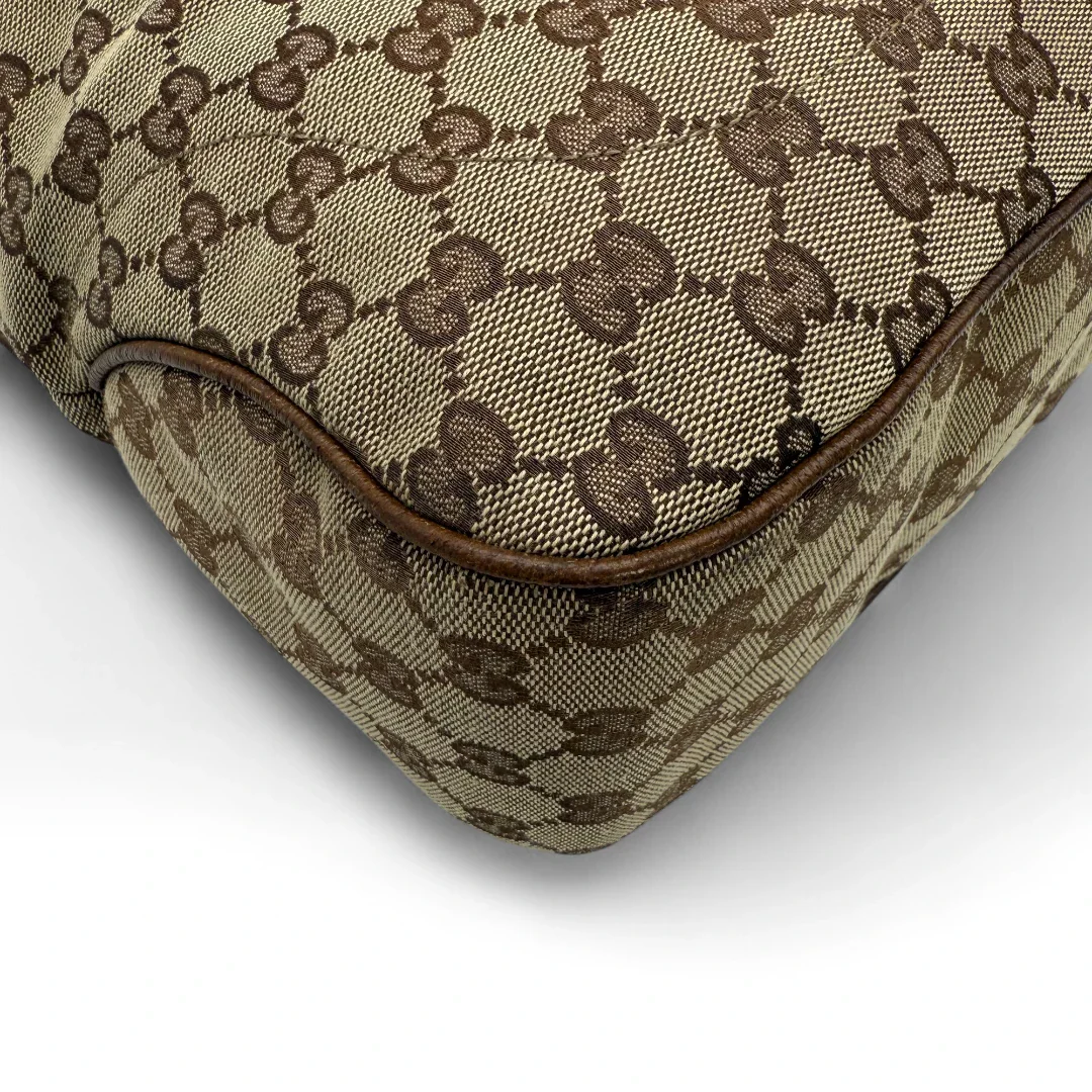 https://cdn.shopify.com/s/files/1/0564/9376/8855/files/Gucci_Handtasche_Jackie_Tote_bag_monogram_beige_Vintage_luxury_GG_handbag1294.webp?v=1752678251