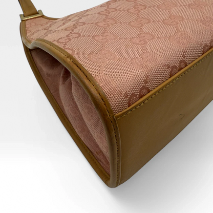 https://cdn.shopify.com/s/files/1/0564/9376/8855/files/Gucci_Handtasche_Jackie_hellbraunes_Leder_monogram_rosa_vintage_designer_GG_handbag_4682.webp?v=1745484466