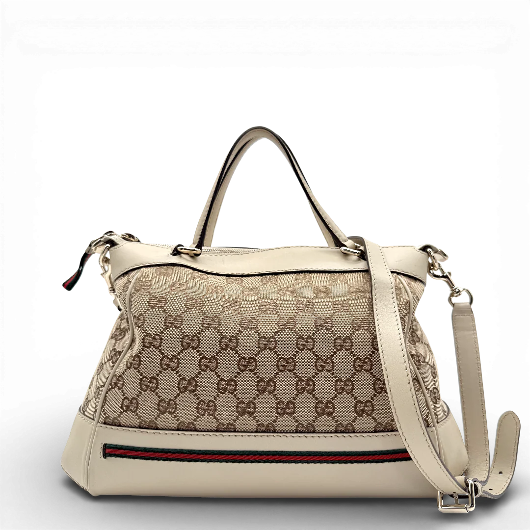 https://cdn.shopify.com/s/files/1/0564/9376/8855/files/Gucci_Handtasche_Mayfair_mit_Umhangegurt_Lederdetails_beige_monogram_beige_vintage_GG_0978.webp?v=1770899106