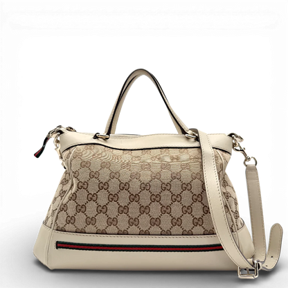 https://cdn.shopify.com/s/files/1/0564/9376/8855/files/Gucci_Handtasche_Mayfair_mit_Umhangegurt_Lederdetails_beige_monogram_beige_vintage_GG_0978.webp?v=1770899106