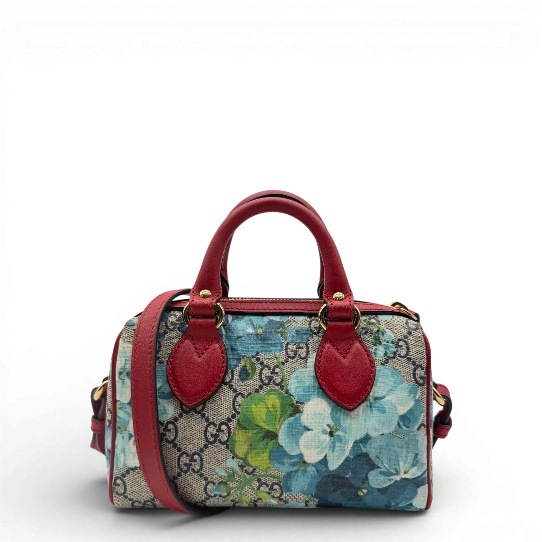 https://cdn.shopify.com/s/files/1/0564/9376/8855/files/Gucci_Handtasche_Mini_Boston_Floral_mit_Umhangegurt_monogram_beige_vintage_GG6176.webp?v=1778152844