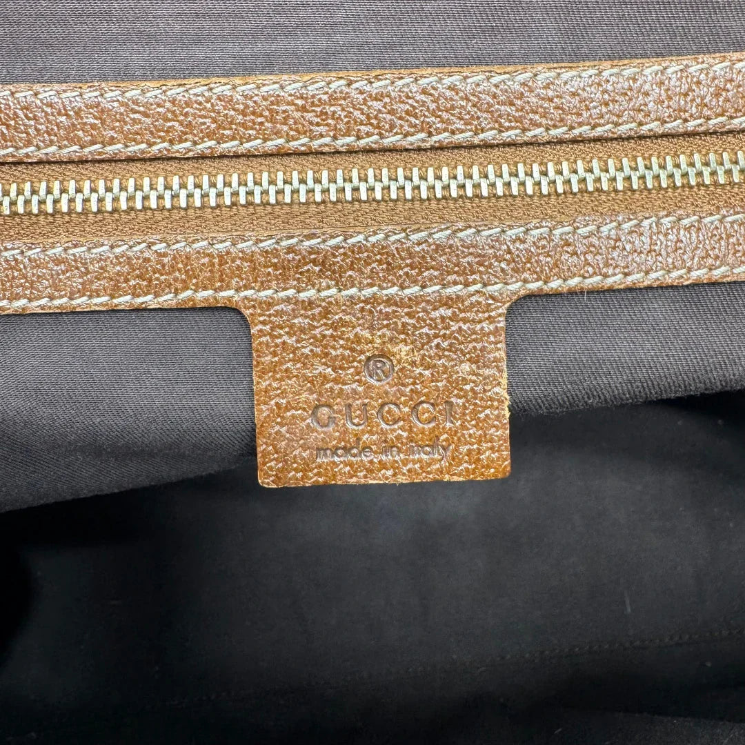 https://cdn.shopify.com/s/files/1/0564/9376/8855/files/Gucci_Handtasche_Nailhead_mini_Tote_monogram_beige_17.webp?v=1784244108