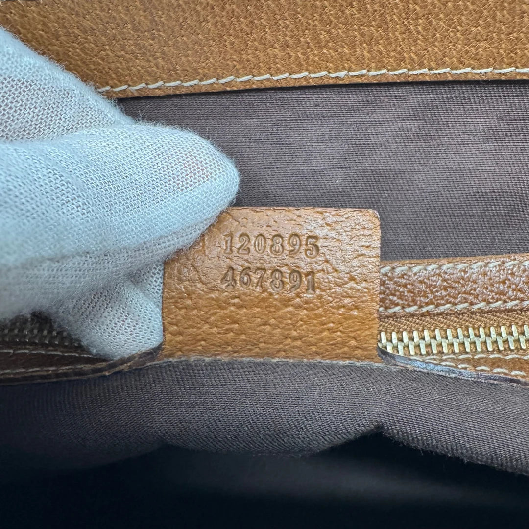 https://cdn.shopify.com/s/files/1/0564/9376/8855/files/Gucci_Handtasche_Nailhead_mini_Tote_monogram_beige_18.webp?v=1784244108