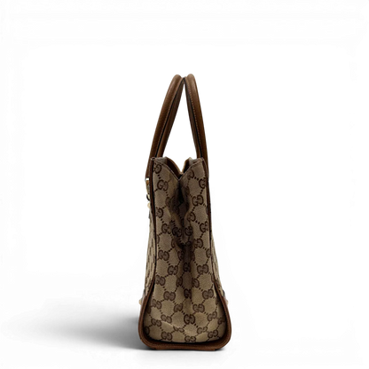 https://cdn.shopify.com/s/files/1/0564/9376/8855/files/Gucci_Handtasche_Nailhead_mini_Tote_monogram_beige_2.webp?v=1784244108