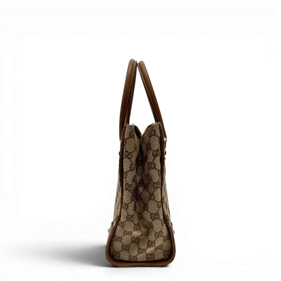 https://cdn.shopify.com/s/files/1/0564/9376/8855/files/Gucci_Handtasche_Nailhead_mini_Tote_monogram_beige_3.webp?v=1784244107