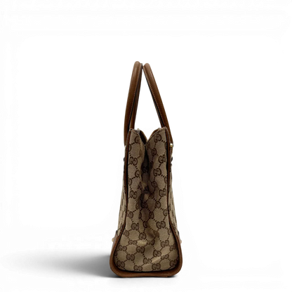 https://cdn.shopify.com/s/files/1/0564/9376/8855/files/Gucci_Handtasche_Nailhead_mini_Tote_monogram_beige_3.webp?v=1784244107