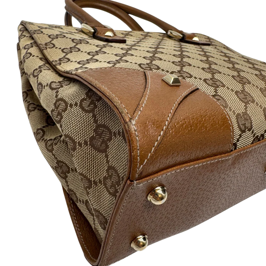 https://cdn.shopify.com/s/files/1/0564/9376/8855/files/Gucci_Handtasche_Nailhead_mini_Tote_monogram_beige_8.webp?v=1784244108