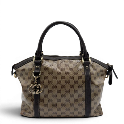 https://cdn.shopify.com/s/files/1/0564/9376/8855/files/Gucci_Handtasche_PVC_monogram_beige_vintage_GG7316.webp?v=1778680998