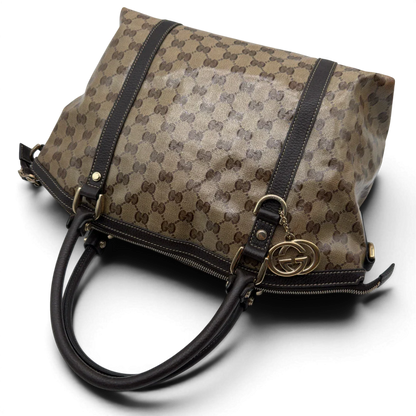 https://cdn.shopify.com/s/files/1/0564/9376/8855/files/Gucci_Handtasche_PVC_monogram_beige_vintage_GG7325.webp?v=1778680999