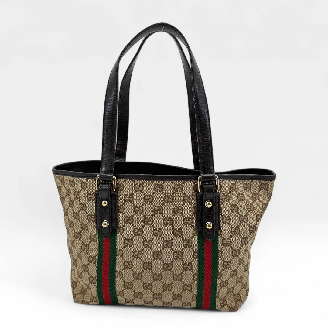 https://cdn.shopify.com/s/files/1/0564/9376/8855/files/Gucci_Handtasche_Shopper_Sherry_Line_monogram_beige_vintage_GG_handbag9839.webp?v=1761830891