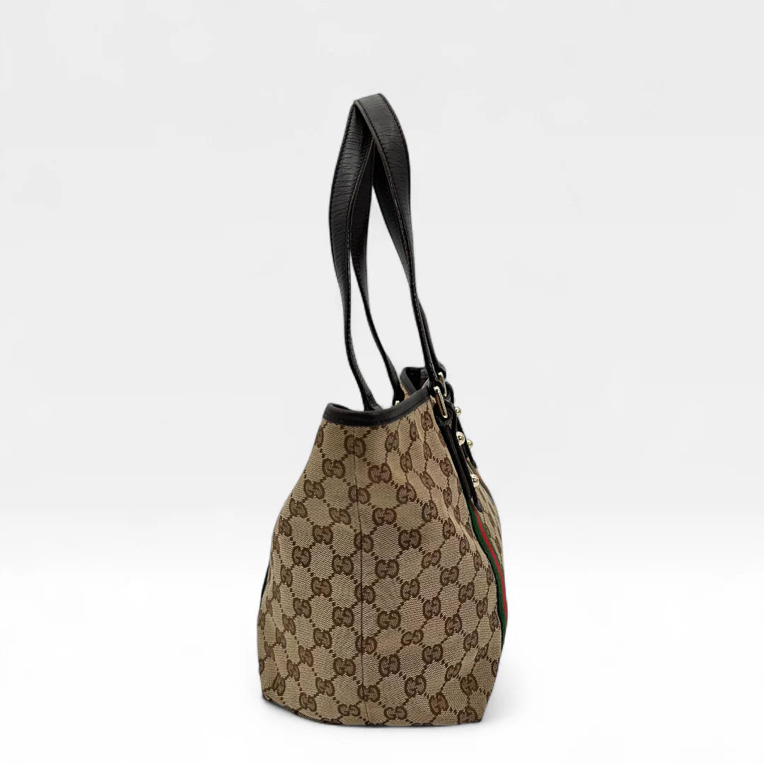 https://cdn.shopify.com/s/files/1/0564/9376/8855/files/Gucci_Handtasche_Shopper_Sherry_Line_monogram_beige_vintage_GG_handbag9841.webp?v=1761830891