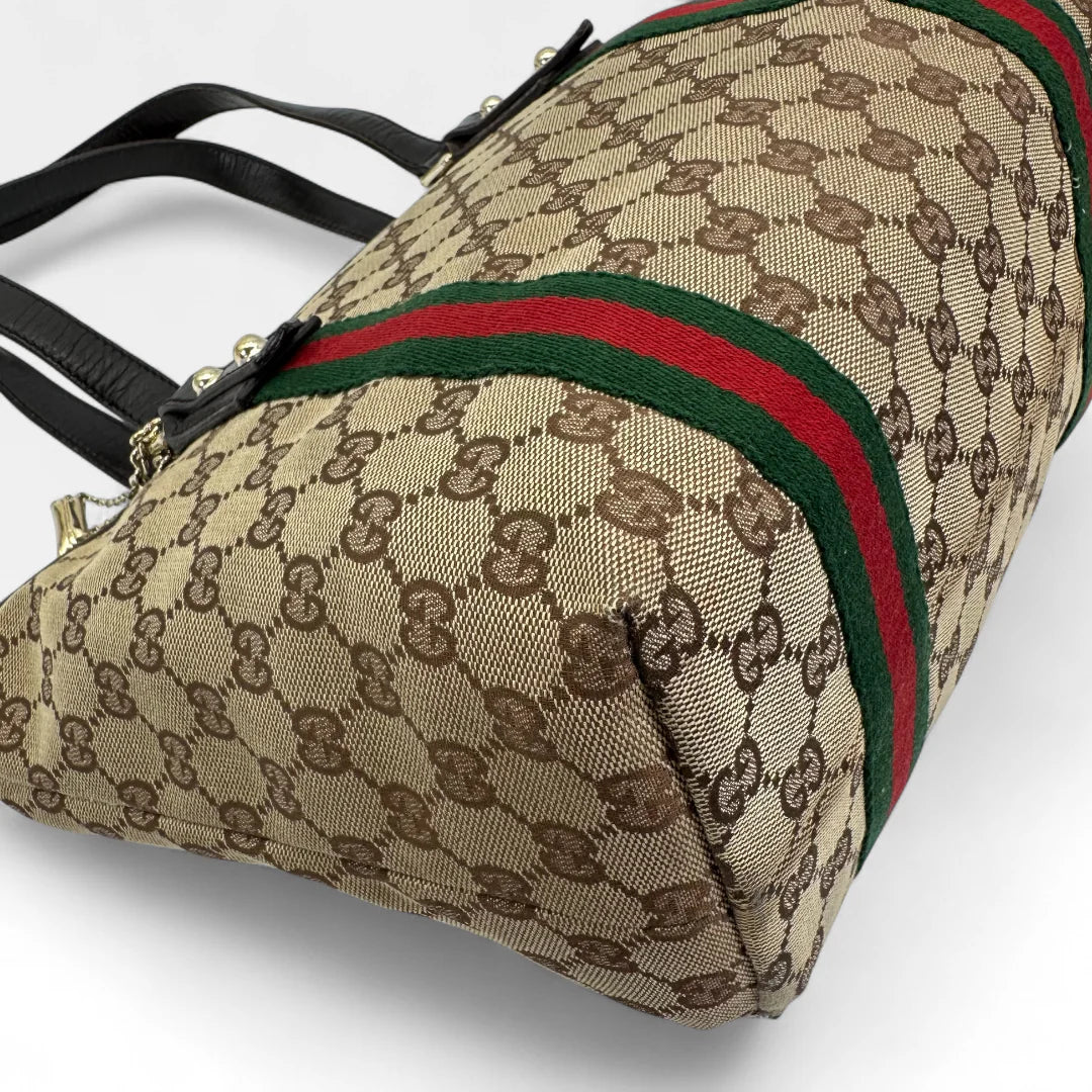 https://cdn.shopify.com/s/files/1/0564/9376/8855/files/Gucci_Handtasche_Shopper_Sherry_Line_monogram_beige_vintage_GG_handbag9844.webp?v=1761830891