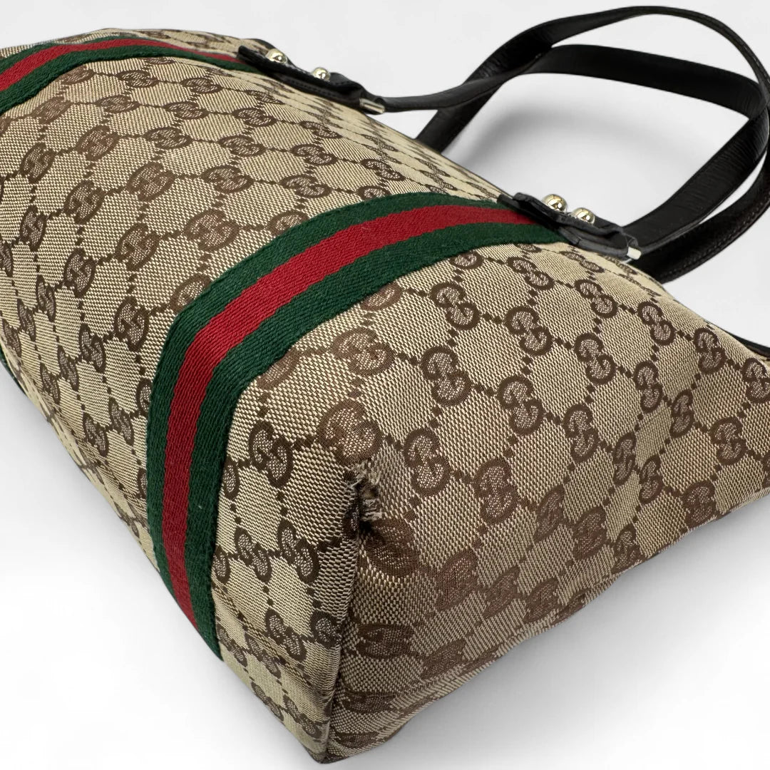 https://cdn.shopify.com/s/files/1/0564/9376/8855/files/Gucci_Handtasche_Shopper_Sherry_Line_monogram_beige_vintage_GG_handbag9845.webp?v=1761830891