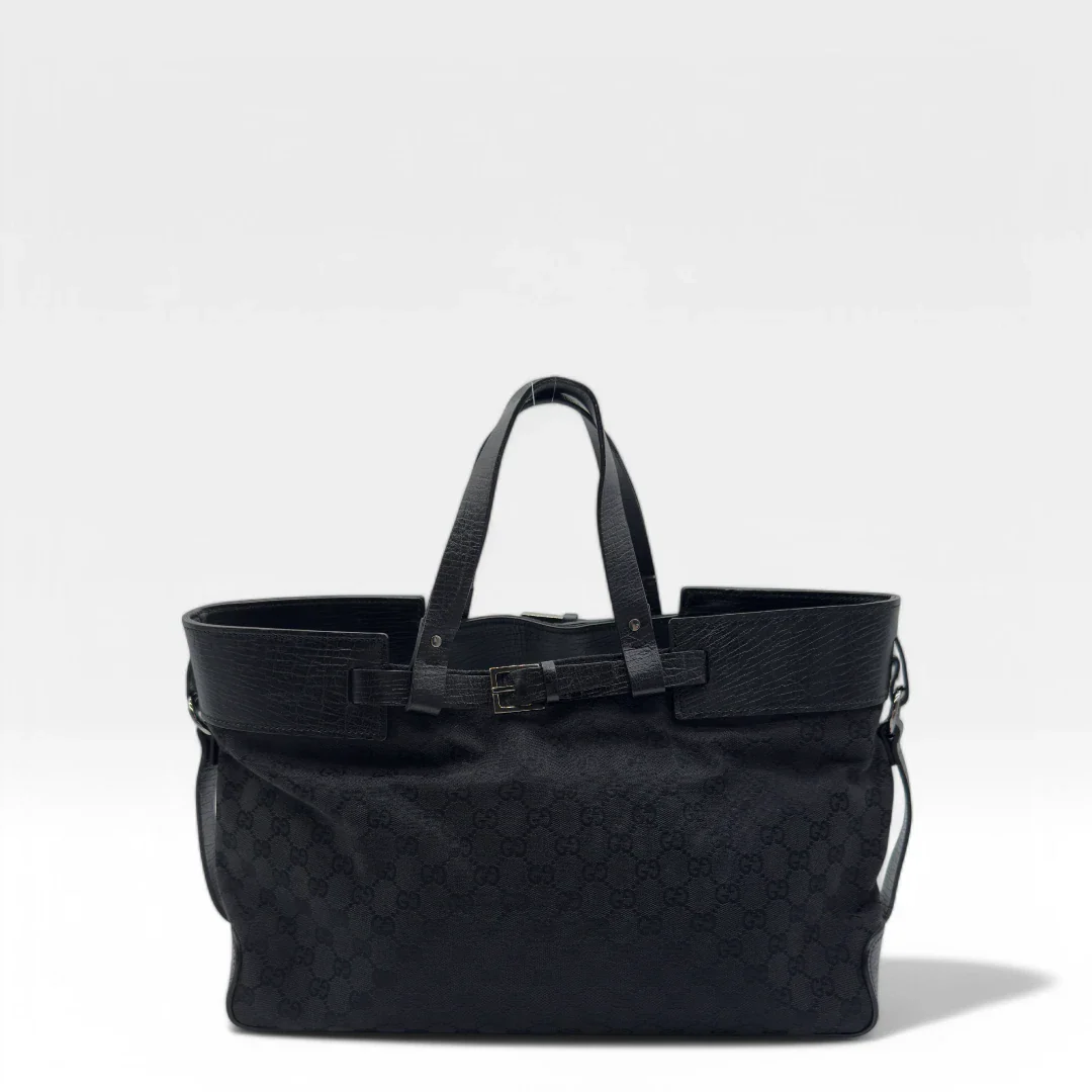 https://cdn.shopify.com/s/files/1/0564/9376/8855/files/Gucci_Handtasche_Shopper_mit_einer_Schnallen_aus_Stoff_monogram_schwarz_vintage_luxury_GG_shopper_8467.webp?v=1742397645