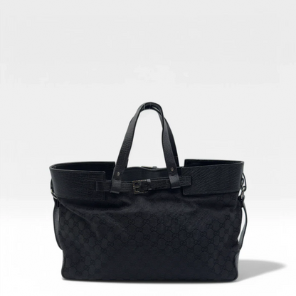https://cdn.shopify.com/s/files/1/0564/9376/8855/files/Gucci_Handtasche_Shopper_mit_einer_Schnallen_aus_Stoff_monogram_schwarz_vintage_luxury_GG_shopper_8467.webp?v=1742397645
