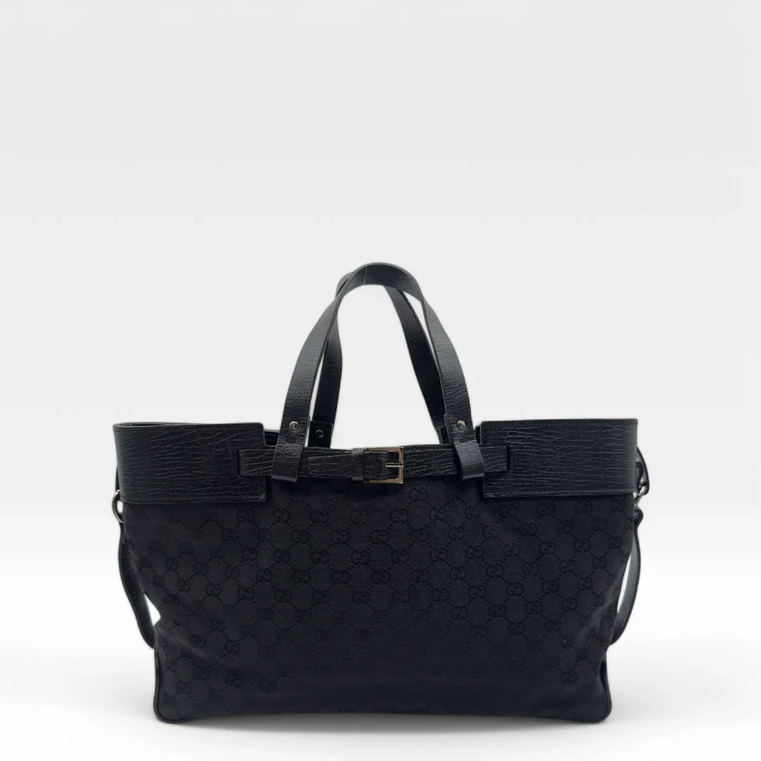 https://cdn.shopify.com/s/files/1/0564/9376/8855/files/Gucci_Handtasche_Shopper_mit_einer_Schnallen_aus_Stoff_monogram_schwarz_vintage_luxury_GG_shopper_8476.webp?v=1741956977
